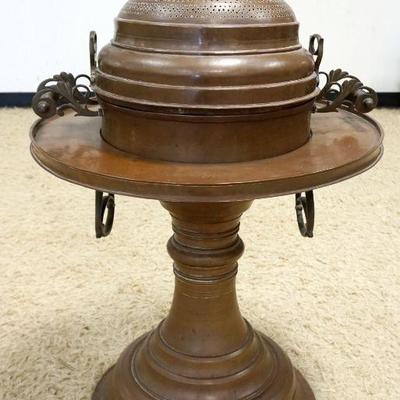 1071	LARGE ASIAN MULTISECTION COPPER VESSEL	LARGE ASIAN MULTISECTION COPPER VESSEL, APPROXIMATELY 24 IN X 36 IN HIGH
