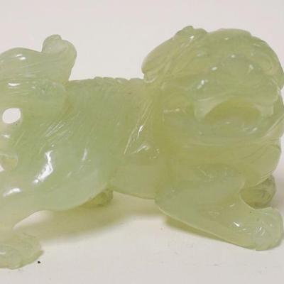 1234	JADE CARVED FOO DOG, APPROXIMATELY 2 1/2 IN HIGH
