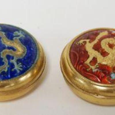 1202	LOT OF 4 GILT METAL & ENAMEL ROUND BOXES	LOT OF 4 GILT METAL & ENAMEL ROUND BOXES, EACH APPROXIMATELY 2 1/2 IN X 1 IN HIGH
