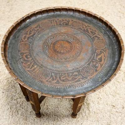 1068	ASIAN TOOLED COPPER TRAY	ASIAN TOOLED COPPER TRAY ON FOLDING WOOD STAND, APPROXIMATELY 20 IN X 19 IN HIGH
