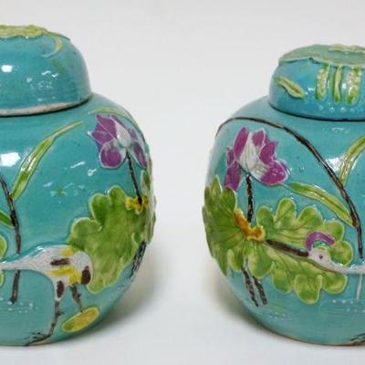 1005	PAIR OF ASIAN COVERED JARS	PAIR OF ASIAN COVERED JARS, APPROXIMATELY 5 IN HIGH
