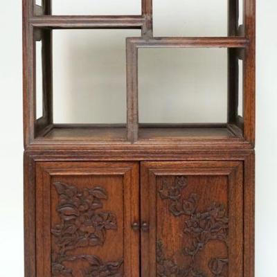 1010	CHINESE 2 PART MINIATURE WOOD CABINET	CHINESE 2 PART MINIATURE WOOD TABLE TOP CABINET W/CARVED PANELED DOORS, APPROXIMATELY 12 IN X...