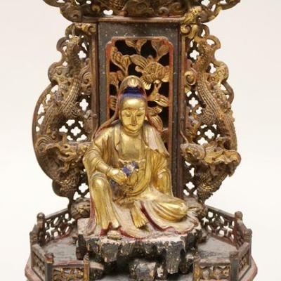 1012	INTRICATE CARVED WOOD ASIAN GILT FIGURE	INTRICATE CARVED WOOD ASIAN GILT FIGURE IN TEMPLE LIKE SETTING, APPROXIMATELY 17 IN HIGH,...