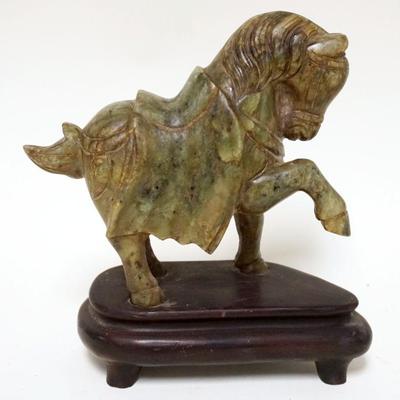 1034	JADE HORSE ON WOOD BASE	JADE HORSE ON WOOD BASE, MARKED CHINA 1907 ON BASE, APPROXIMATELY 7 1/4 IN HIGH
