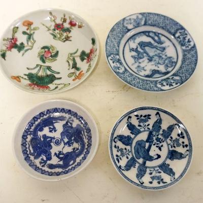 1269	LOT OF 4 ASIAN PLATES, LARGEST APPROXIMATELY 5 IN

