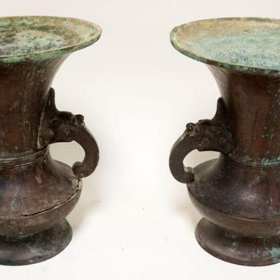 1048	PAIR OF BRONZE DOUBLE HANDLED URNS	PAIR OF BRONZE DOUBLE HANDLED URNS, APPROXIMATELY 10 1/4 IN
