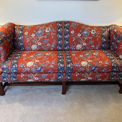 Camel back upholstered sofa $420