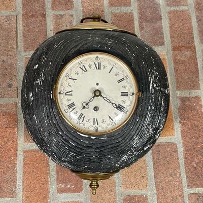 PAINTED ORB CLOCK | Very heavy! Orb-shaped faux bois body with black paint housing a clock face with Roman numerals
Dimensions: h. 14 x...