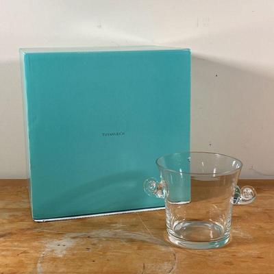 TIFFANY & CO. BLOWN GLASS VASE | Of tapered form with scrolled handles, signed on the bottom; with a large Tiffany blue box
Dimensions:...