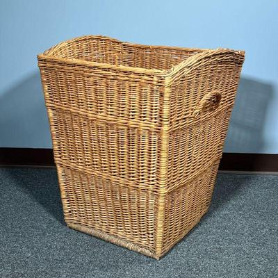 ANTIQUE WOVEN BASKET | Three sections of pattern with a handle on either side bowed opening with an old Manila tag â€œHarry Rogovinâ€...