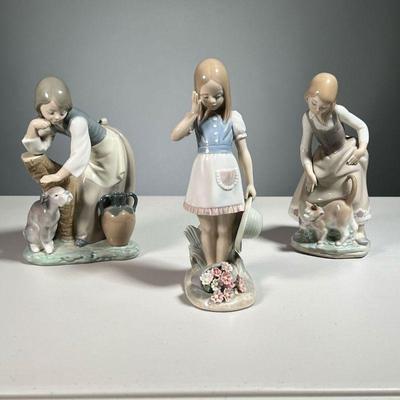 (3PC) LLADRÃ“ FIGURES | Made in Spain. Girl with vase and dog, girl with cat, girl with basket of flowers.
Dimensions: h. 9 in 