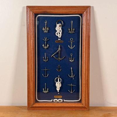 FRAMED MINIATURE ANCHORS | Original anchor display of historical anchor types, and with sailor knots and anchor hitch display....