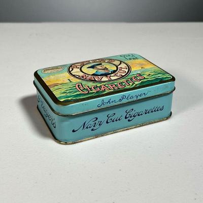 PLAYER'S TOBACCO TIN | Player's Navy Cut Cigarettes, Gold Leaf
Dimensions: l. 4-3/4 x w. 3-1/4 in 