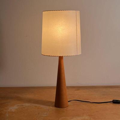 MODERN TABLE LAMP | Tapering wood table lamp of modern design with a stitched leather-type shade, semi-translucent
Dimensions: h. 24 x...