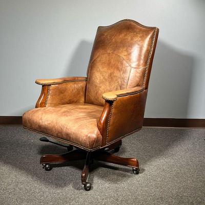 CUSTOM OFFICE CHAIR | Seven Seas Seating saddle brown leather executive's office chair on a wooden frame base swiveling with brass tacks...