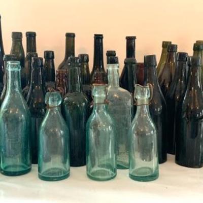Large collection of antique bottles, 3 part molds, blob tops and embossed.