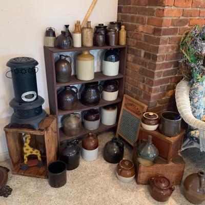 Part large collection of stoneware crocks, jugs and bottles.