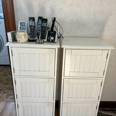 Pair of White Three-Level Cabinets $10/each