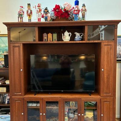 Entertainment Center with Smart TV. Sold together or separate