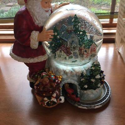 Large Musical Santa Snow Globe Lights Up, Train Moves, & Plays â€œWe Wish You A Merry Christmas