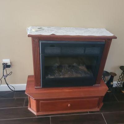 Faux, electric fireplace