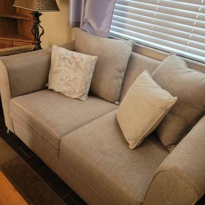 Love seat, no rips or tears in the fabric