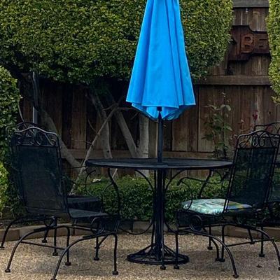 Patio Furniture, Wrought iron table and chairs with umbrella