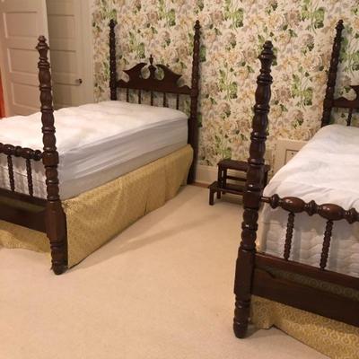Beautiful solid cherry, Davis cabinet twin high poster beds.