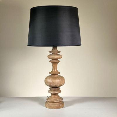 TURNED WOOD LAMP | Turned wood table lamp with a black shade; h. 27.5 x dia. 12.5 in  