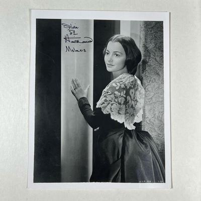 [AUTOGRAPH] OLIVIA DE HAVILLAND | Olivia de Havilland. An excellent 8 X 10 signed photograph as Melanie in the epic film Gone With The...