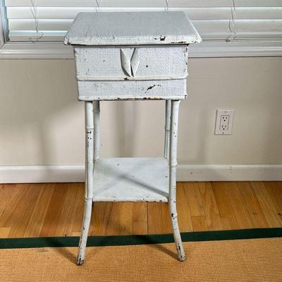 PAINTED WICKER STAND | White painted wicker stand with flip top and open lower shelf. - l. 14 x w. 14 x h. 30 in 