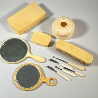 CELLULOID DRESSER SET | Includes 2 hand mirrors, soap holder, a hair collector, brush & storage case. 