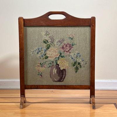 NEEDLEPOINT FIRE SCREEN | Having a still life needlepoint showing of vase of flowers behind glass - w. 20.5 x h. 25.5 in 