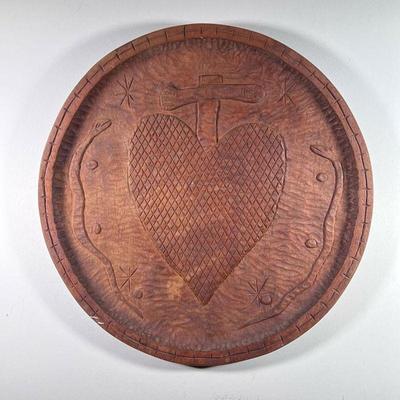 IRISH CARVED WOOD PLAQUE | Showing a central heart with serpents on either side and stars - dia. 22 in 