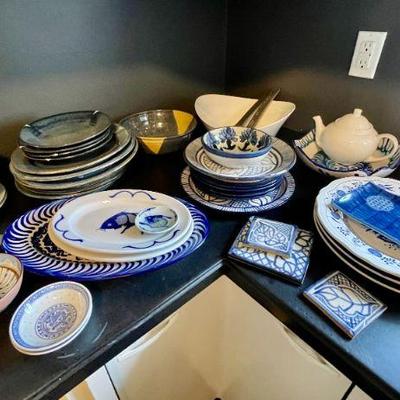 Lot 012-K: Eclectic Blue and White Dishware Collection

Features: An eclectic mix of plates, bowls, serving dishes and more to create an...