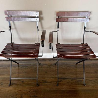 Lot 015-LR: Metal and Wooden Folding Chairs

Features: A pair of sturdy metal and wooden folding chairs. 

Dimensions: 2â€™W x 12â€ Seat...