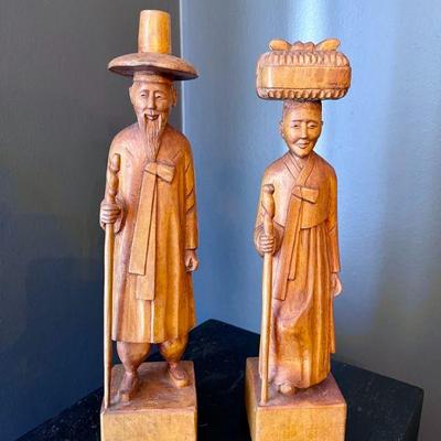 Lot 008-DR: Pair of Wooden Carved Figures

Features: 
â€¢	A wooden carved depiction of a traditional rural Asian man and women
â€¢...