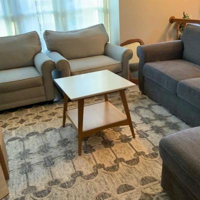 Accent chairs, mid century table and L shaped couch, crate and barrel carpet 