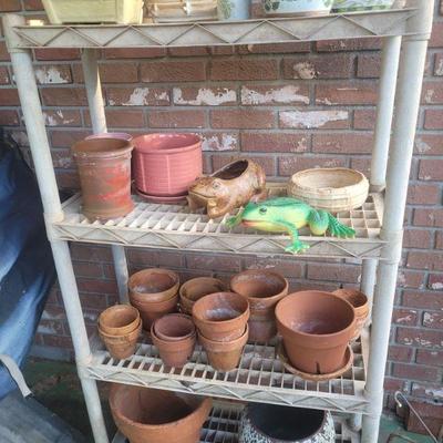 Rack with lots of pots  for plants