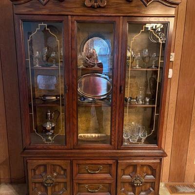 Vintage China Cabinet with under storage and above lighting with glass shelves. 