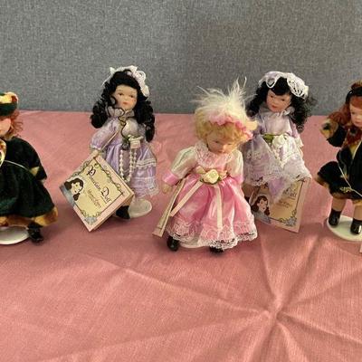 5 porcelain dolls