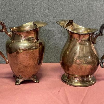 2 silver plated pitchers
