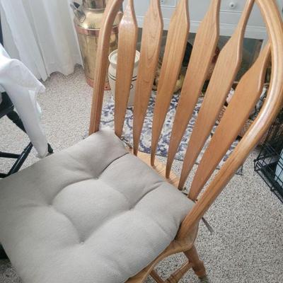 One of the four chairs that go with the dining room table and chairs