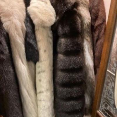 Several fur coats