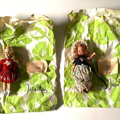 These 2 vintage dolls in their Jordan Marsh bags with receipts.