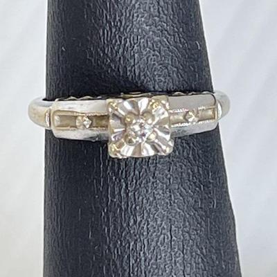 Gold Ring with small diamond accent