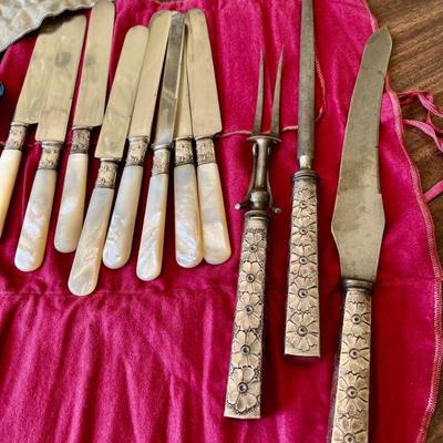 Antique set of 8 mother-of-pearl butterknives with sterling collar and antique repoussÃ© sterling carving set