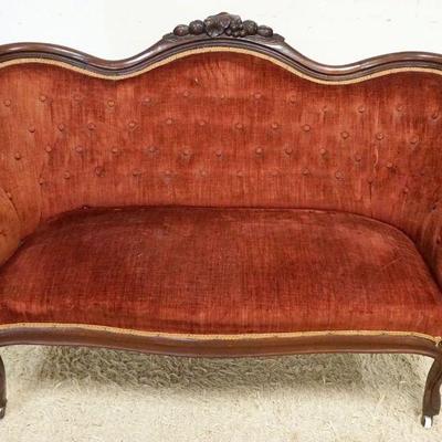 1124	WALNUT VICTORIAN UPHOLSTERED SETTEE W/TUFTED BACK, BUTTON MISSING, APPROXIMATELY 56 IN WIDE X 36 IN HIGH, SOME WEAR TO UPHOLSTERY
