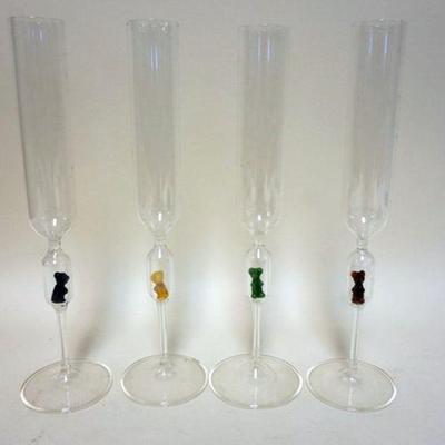 1226	SET OF 4 CHAMPANGE FLUTES WITH BEARS IN HOLLOW STEMS, APPROXIMATELY 11 1/4 IN, NUMBERED ON BASES
