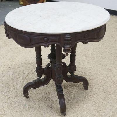 1100	ORNATE WALNUT VICTORIAN ROUND MABLE TOP PARLOR TABLE, APPROXIMATELY 30 IN X 30 IN HIGH
